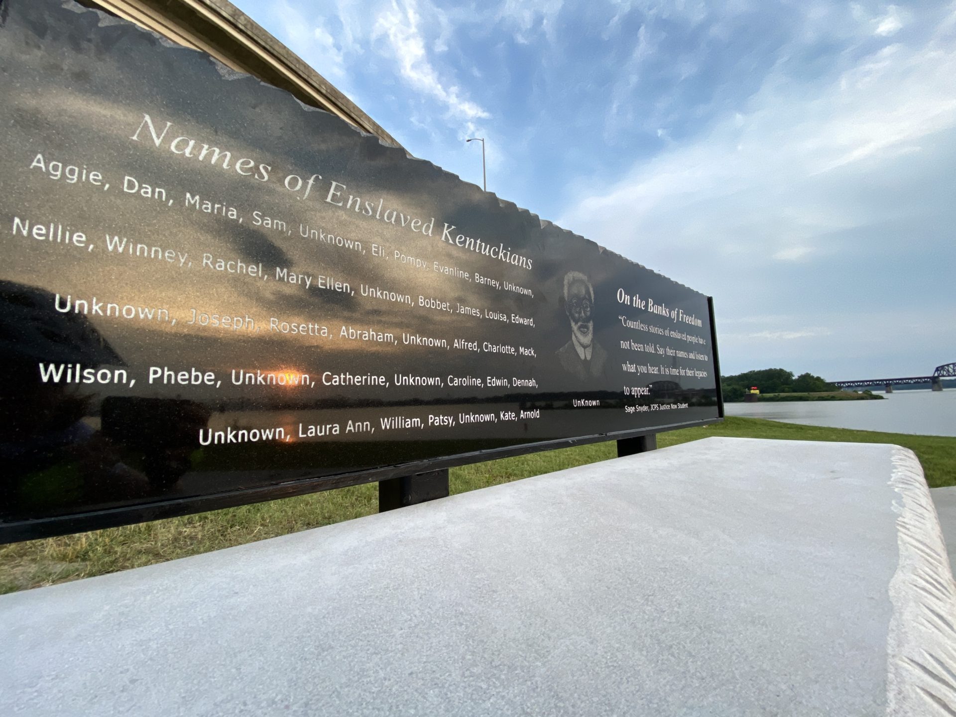 closeup photo of the On the Banks of Freedom bench